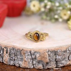 ♠ Item Details:- Natural Tiger Eye Ring For Women, Gold Ring, Unique Ring, Flower Tigers Eye Ring, Leaf Ring, Statement Ring, Sister Gift, Birthday Gifts, Metal:- , Brass Packing- Your jewelry will be nicely packaged. If one or more items are gifts, please leave us a note at checkout and we'll pack them separately. We would be happy to send your personal note with it. We accept custom and personalized orders. It can be changed in the gemstone, Ring design, and Ring size. Please send us a message Spiritual Carved Gold Ring, Tiger Rings Women, Tigers Eye Ring For Women, Women Gold Ring, Ring For Women Gold, Tigers Eye Signet Ring, Tigers Eye Ring Gold, Tigers Eye Ring, Gold Ring Unique