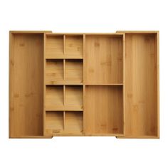 an empty wooden shelf with compartments on it