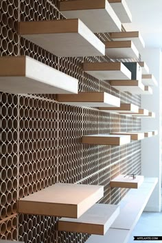 the shelves are made out of wood and metal