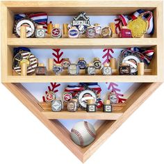 a wooden shelf filled with lots of different types of wrist watches and baseballs on display