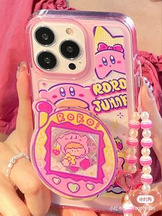 a person holding up a cell phone case with an image of a hello kitty on it