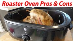 there is a roaster oven with a chicken in it