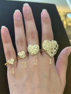 All item In USA and Made to Order - 100% Brand New & High Quality Ring - Material: 10K Gold - Color: Yellow Gold - Size: 6 ~ 13 - Height: 12.2mm(0.5 inch) - Weight(Average): 1(5.1g) 2(2.5g) 3(1.7g) 4(1.3g) 5(1.4g) * This is an approximate size & weight. Please allow up to ±10% difference. * If you have any other resize request, please leave a message when you check out. Gold Nugget Rings, Gold Nugget Ring Women, Heart Nugget Ring, Nugget Rings Gold, Nugget Rings, Gold Nugget Jewelry, Body Jewelry Diy, Custom Gold Jewelry