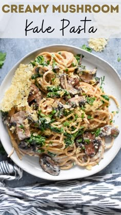 creamy mushroom kale pasta on a white plate