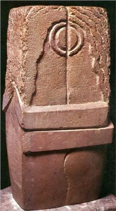 a large stone sculpture sitting on top of a table