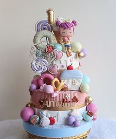 there is a cake that has many decorations on it