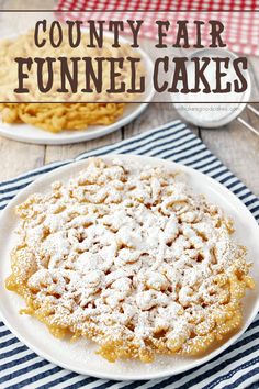 two plates with funnel cakes on them and the words country fair funnel cakes above it