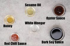 different types of sauces and condiments on a white table top with words describing them