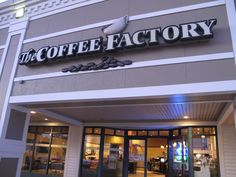 the coffee factory is located in an upscale shopping district