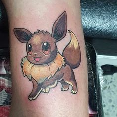 a small tattoo of a pikachu on the leg