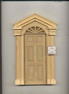 a wooden door with a sign on it