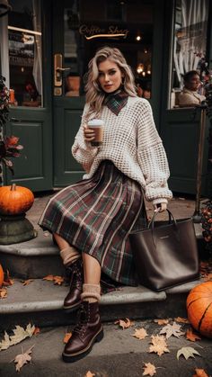 Stay warm and stylish this fall with a chunky, oversized sweater in cream or taupe, tucked into a pleated plaid skirt with muted autumn colors. Complete the look with knee-high dark brown leather boots for a chic seasonal vibe! #FallFashion #CozyOutfit #PlaidSkirt #AutumnOutfits Muted Autumn, Pleated Plaid Skirt, Dark Brown Leather Boots, Chunky Oversized Sweater, Cozy Fall Outfits, Tough Girl, Fall Outfit Ideas, Autumn Colors, Cozy Outfit