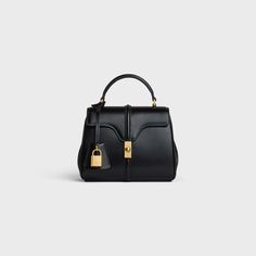 MINI 16 in satinated calfskin - Black | CELINE High-end Formal Shoulder Bag With Lock, Celine 16, Fragrance Bottle, Plastic Shoes, New Fragrances, Hand Cream, Natural Leather, Luxury Handbags, Belt Bag