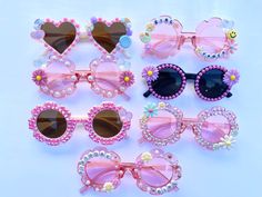 These fun rainbow sprinkle sunglasses fit most 2-8 year olds. Pink Fun Sunglasses With Polarized Lenses, Cute Summer Sunglasses For Birthday, Handmade Sunglasses For Summer Parties, Fun Pink Tinted Sunglasses, Fun Pink Sunglasses For Gift, Playful Party Sunglasses With Polarized Lenses, Fun Handmade Sunglasses For Summer, Playful Polarized Sunglasses For Party, Fun Pink Handmade Sunglasses