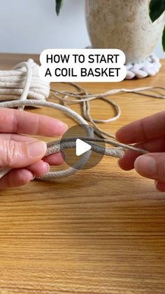 two hands holding scissors and rope on a table with text that reads how to start a coil basket