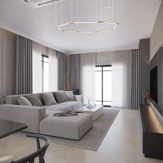 a modern living room with gray and white furniture, large window curtains, and a flat screen tv mounted on the wall