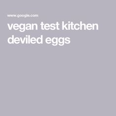 the words vegan test kitchen deviled eggs are in white letters on a gray background