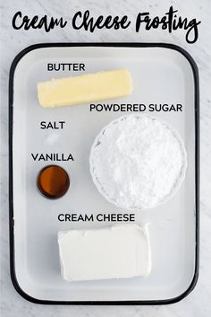 ingredients to make cream cheese frosting on a tray