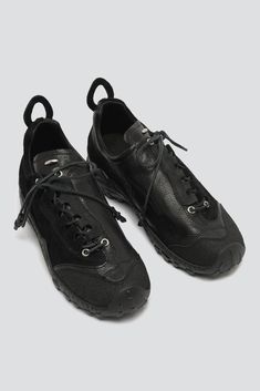 Stealth Black Leather Gabe Shoe from Our Legacy. Produced in a Netherlands goat suede with a contrast panel construction. Generous fit. Asymmetrical lacing. Rounded leather laces with rubber-coated tips. A contrast polyurethane toe cap. Vibram sole. Oval heel pull. Metal Our Legacy rivet on the tongue. - 100% Goat Leather - Please note that sizing is mens EU. We recommend going down one size for women's EU equivalent. Black Lace Shoes, Round Leather, Our Legacy, Goat Leather, Suede Sneakers, Mens Street Style, Leather And Lace, Me Too Shoes