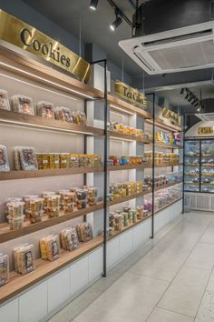 the inside of a store with shelves filled with food