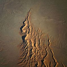 an aerial view of sand dunes in the ocean, taken by nasa's curiosity