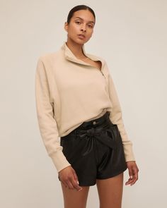 Modern and minimal, our So Uptight Funnel Neck Zip Sweatshirt is the perfect cozy. Style yours back to any of our high-waist pants or juxtapose by pairing it with a leather pant. Funnel neck Exposed side zipper detail Ribbed trim at neck, cuffs and hem Relaxed fit French Terry loop-back interior 100% Cotton Model is 5'10 and wearing a size S. This style runs true to size. We would recommend taking your regular size. Marissa Webb, Cozy Style, Leather Pant, Exposed Zipper, Trim Detail, Funnel Neck, Zip Sweatshirt, High Waisted Denim, Modern Fashion