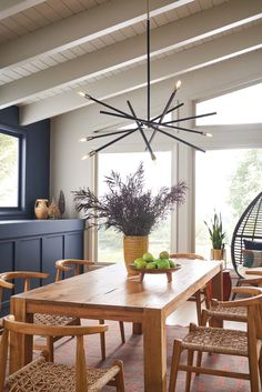 a dining room table with fruit on it