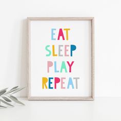 an art print with the words eat sleep play repeat