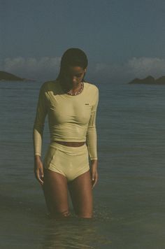 The Poppler is our new long sleeve rash-guard top. A second-skin, full-coverage silhouette that is perfect for roaming the ocean while being protected from the sun.This is a doubble layer cropped top, with U shaped scooped neck. Throw it on, on top of your favorite bikini set, or pair it with our matching bottoms. Cropped Rashguard U scooped neck Long sleeve Single layer Dry Fast and UV protective Chlorine resistant Sydney is wearing S Sun Protection Clothing Woman, Rashguard Outfit, Rash Guard Women Swimwear, Coverage Swimsuit, Lifestyle Journal, Surf Style Clothes, Ocean Sports, Upf Clothing, Solo Trip