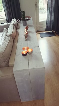 a table that has candles on top of it