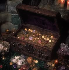 an old trunk filled with coins and candles