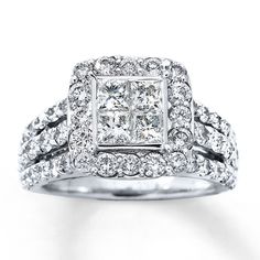 a diamond engagement ring with two rows of diamonds