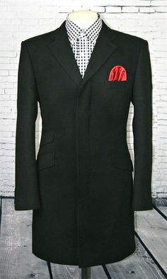 The Modclothin 3/4 Overcoat 100% wool. Crafted immaculately with classic red lining ticket pocket and breast pocket. An iconic look of days gone by. Top styling for any occasion.    Modclothin 3/4 Length Overcoat  100% Wool Breast Pocket Red Lining 4 Concealed Button Front 4 Button Cuff Single Vent Back 5 Colour Choices Please move up a size  if your wanting to wear over suit. *Please note these overcoat are handmade to order will take about 4 weeks before dispatch. Classic Black Wool Coat With Pockets, Classic Red Long Wool Coat, Classic Red Wool Coat, Skinhead Clothing, Days Gone, 1960s Fashion, Black Jacket, Color Choices, Women's Blazer