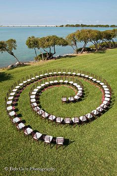 a circular table set up in the middle of a field