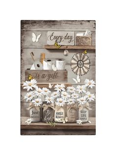 a wooden sign with daisies and other items on it that says every day is a gift