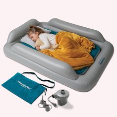 an inflatable bed with a child sleeping on it