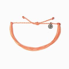 Solid Peach Bracelet by Pura Vida Pura Vida Original Bracelet in the Color Peach It’s the bracelet that started it all. Each one is handmade, waterproof and totally unique—in fact, the more you wear it, the cooler it looks. Grab yours today to feel the Pura Vida vibes. DEETS: 100% Waterproof Wax-Coated Iron-Coated Copper "P" Charm Adjustable from 2-5 Inches in Diameter Final Sale - No Returns or Exchanges Founded in Costa Rica, Pura Vida Bracelets provides sustainable jobs to artisans worldwide Puravida Bracelet, Pure Vida Bracelets, Bracelets Pura Vida, Pulseras Ideas, Costa Rica Pura Vida, Peach Bracelet, Preppy Jewelry, Pura Vida Bracelets, Buy List