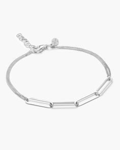 The Multi Link Chain Bracelet features sleek, silver links wrapped in a 1mm chain that doubles back to create a gorgeous layered effect. Pair it with our Paperclip Chain Bracelet for a modern look. Link Chain Bracelet, Paper Clip, Link Chain, Link Bracelets, Chain Bracelet, Silver Bracelet, To Create, Sleek, Bracelet