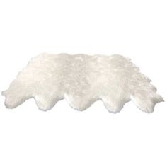 a white sheepskin rug on a white background