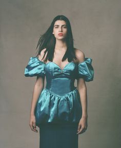 This dress is a traffic-stopping, statement gown that embodies the deliciously ostentatious heights of '80s fashion. Savour a peacockish combination of azure-blue satin, peplum plumage, rhinestone detailing, removable puff-sleeves and billowy bow on the bum.  * Midi-dress * Satin * Peplum waist * Sweatheart neckline * Removeable puff-sleeves * Bow at chest * Rhinestone detailing Fabric: Satin Care: Dry clean only Length: 133cm Bust: 84cm Waist: 72cm Hips: 96cm Model is 186cm/6'1" Sweatheart Neckline, Dress Satin, Azure Blue, Vintage Turquoise, Blue Satin, 1980s Vintage, 80s Fashion, Dress With Bow, Dress Clothes For Women