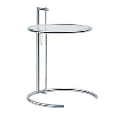 a round glass table with metal legs and a hook on the end section, against a white background