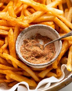 french fries with seasoning in a bowl