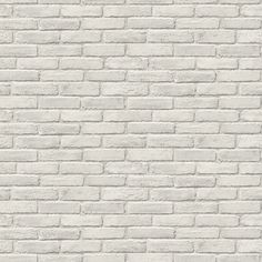 a white brick wall textured with cement