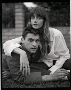 black and white photograph of two people posing for the camera