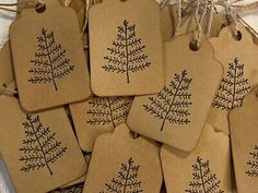 several tags with small trees drawn on them