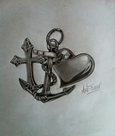 a drawing of an anchor with a heart on it and a keychain attached to it