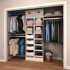 an organized closet with clothes and shoes