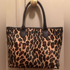 Nwt Beautiful Dkny Large Black Leather Trimmed Leopard Print Pony Hair Tote Bag. Dual Black Leather Handles. Black Leather Bottom. Black Fabric Lining With One Zippered Pocket And One Open Pocket. Magnetic Closure At Top. Gold Tone Hardware. Key Fob And Strap Holders. Includes Black Dkny Dust Bag. Purchased At Bloomingdales 59th Street Store. 5 Star Seller Trendy Brown Bag With Leather Lining, Leather Shoulder Bag In Leopard Print For Everyday, Leopard Print Shoulder Bag For Everyday Use, Leopard Print Leather Shoulder Bag For Everyday Use, Leopard Print Leather Bag, Leopard Print Everyday Bags With Handles, Rectangular Tortoiseshell Shoulder Bag For Everyday Use, Chic Leopard Print Bags For Errands, Chic Tortoiseshell Leather Bag