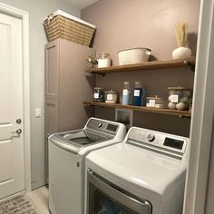 a washer and dryer in a small room