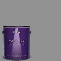 the behr marquee paint is shown in an open, gray - toned color